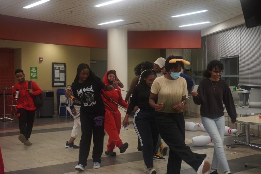 MC students enjoy a group dance to Marcia Griffiths Electric Slide.