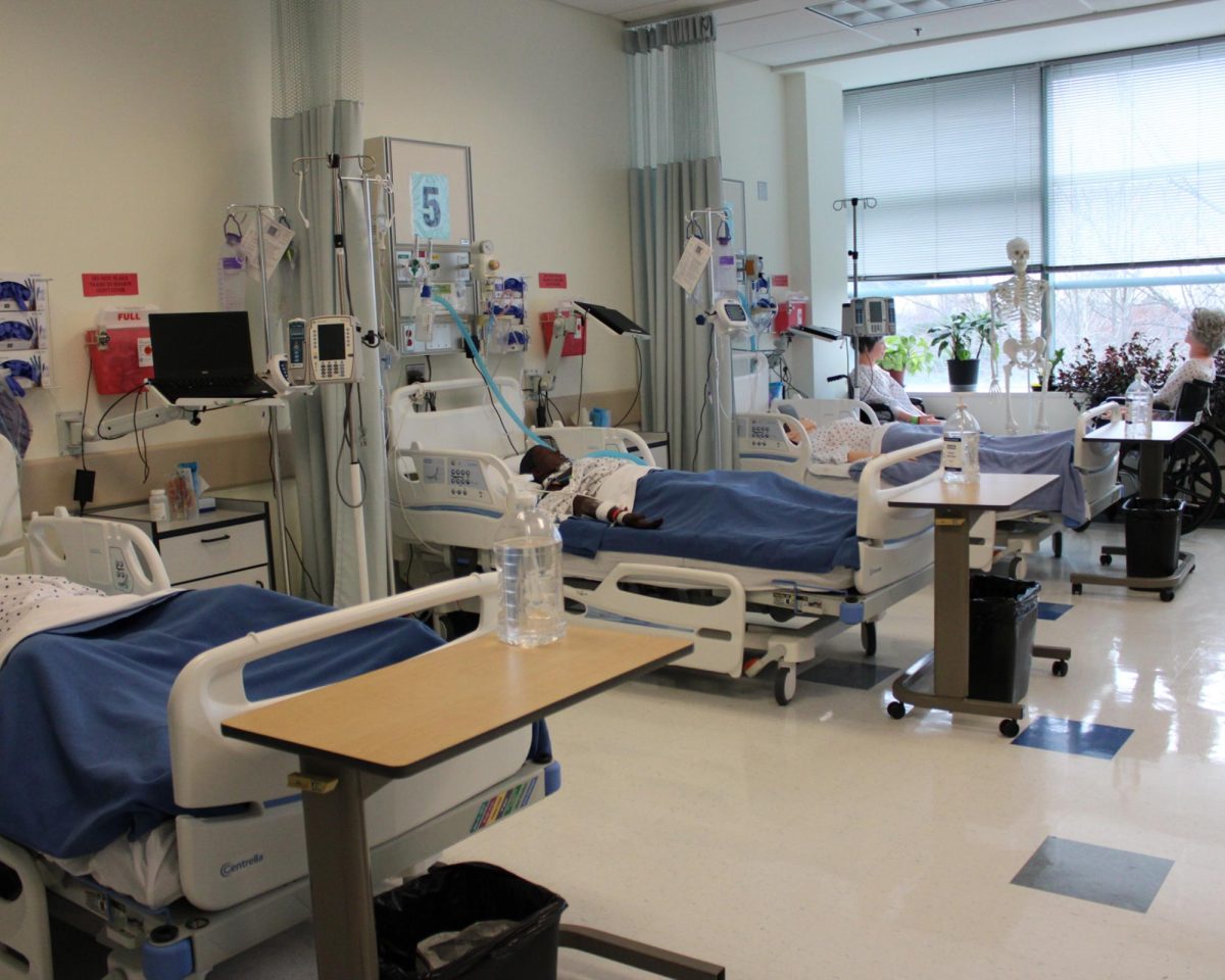 The nursing mannequins in beds and wheelchairs in the Nursing Simulation Practice Lab in the Montgomery College Takoma Park/Silver Spring Campus Health Sciences Center.