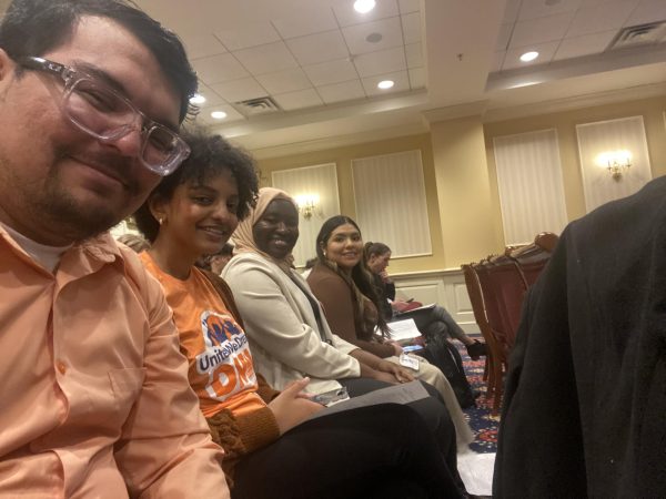 Gerson Quinteros, Yasmine Juhar, Mariam Hashiru, and Luz Gonzales at the Education, Energy, and Environment Committee Hearing room in the Maryland General Assembly. They are waiting to testify in support of SB637. Photo credits: Courtesy of Gerson Quinteros.