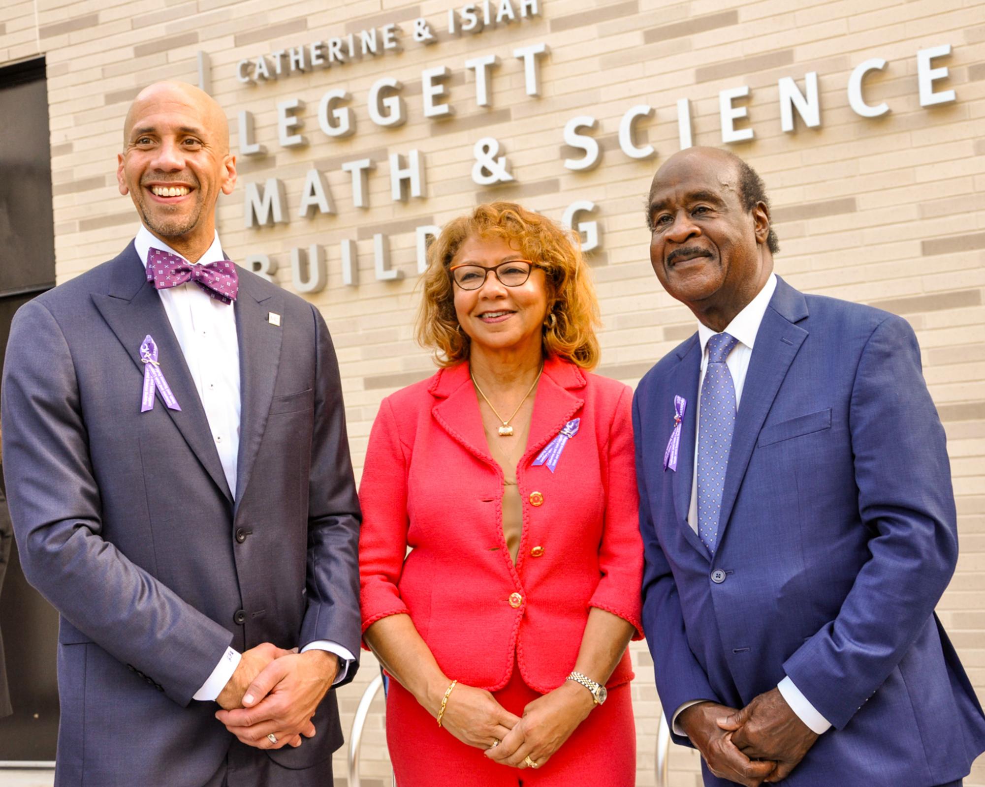 Jermaine F. Williams, President of Montgomery College, and The Leggetts stand before the newly opened Catherine & Isiah Leggett Math & Science Building at the Ribbon Cutting Ceremony.