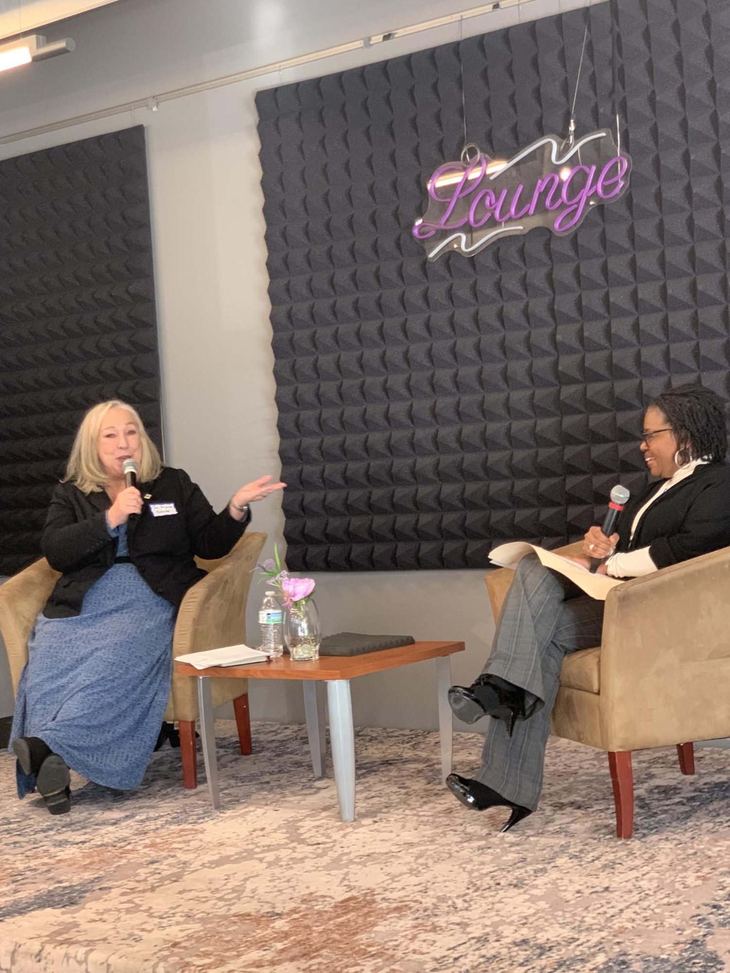 During the meet and greet event on Feb. 18, Acting Campus Dean Fiona Glade, left, shares her journey of how she got to Montgomery College to achieve her goal to attendees. AAWCC-MC President Zenobia Garrison, right, facilitates the Q&A session.