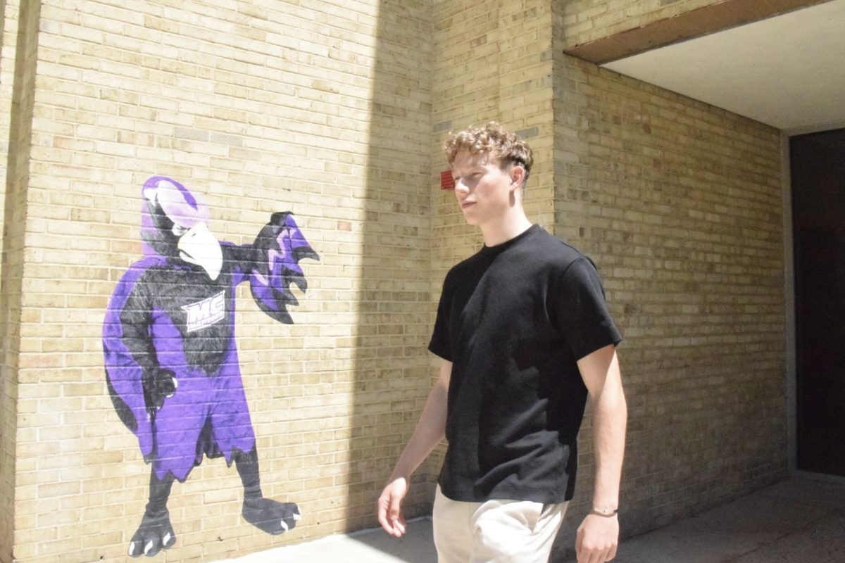 Business administration major Thijs Veldhorst passes a mural of Monty the Raptor, the MC mascot, near the PE building on the Rockville campus. Representing the men's soccer team, Veldhorst realized the extent of student-athlete participation from different MC campuses at the annual athletes’ banquet.
